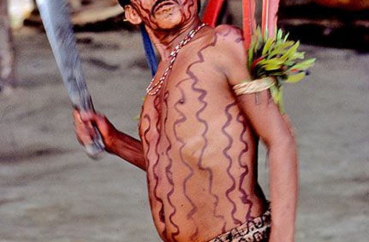 Brazil. Amazon rain forest. Drugged Yanomami indian shaman invokes spirits.